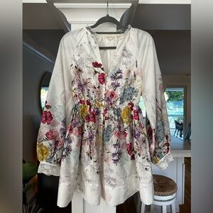 Summer Floral cinched waist dress with dainty flower buttons.